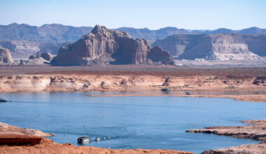 A houseboat is docked on Lake Powell in the Glen Canyon National Recreation Area, as the critical Colorado River reservoir sits at only a third of its capacity on July 10 in Page, Ariz. Credit: Rebecca Noble/Getty Images