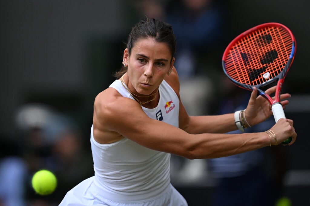 Emma Navarro goes hit a slice backhand at The Championships - Wimbledon 2025