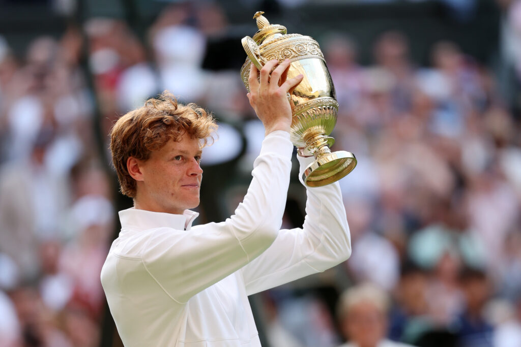 Jannik Sinner poses for pictures with the trophy at the 2025 Championships - Wimbledon