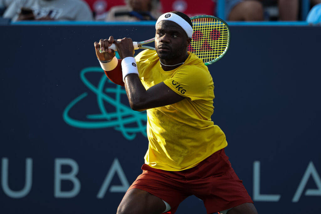 Frances Tiafoe hits a shot