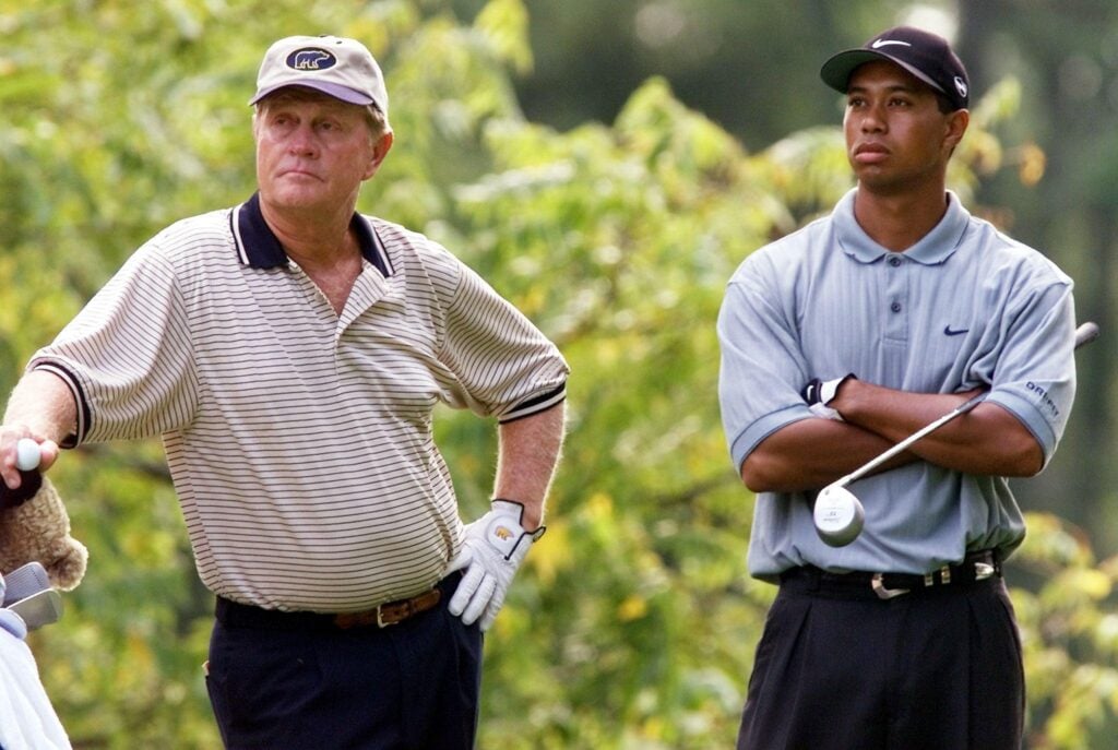 Golf legend Jack Nicklaus (L) and Tiger Woods (R),