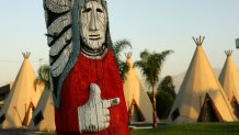 RIALTO, CA - JUNE 15:  The Wigwam Motel, built in 1949 on old Route 66, consists of teepee-shaped individual rooms on June 15, 2007 in Rialto, California. Route 66 opened in 1926 stretching from Chicago to Los Angeles and became a western migration route for people looking for work during the great depression of the 1930's or to escape the Dust Bowl disaster. Later it offered vacation getaways and driving adventures until 1985 when it was decommissioned as a federal highway. Due to neglect and commercial development Route 66, the first highway to connect the Midwest with the West Coast, has recently been added to the biennially compiled list of the world's most endangered landmarks by the World Monuments Fund and the National Trust for Historic Preservation's yearly list of the 11 most endangered historic places in America.  (Photo by David McNew/Getty Images)