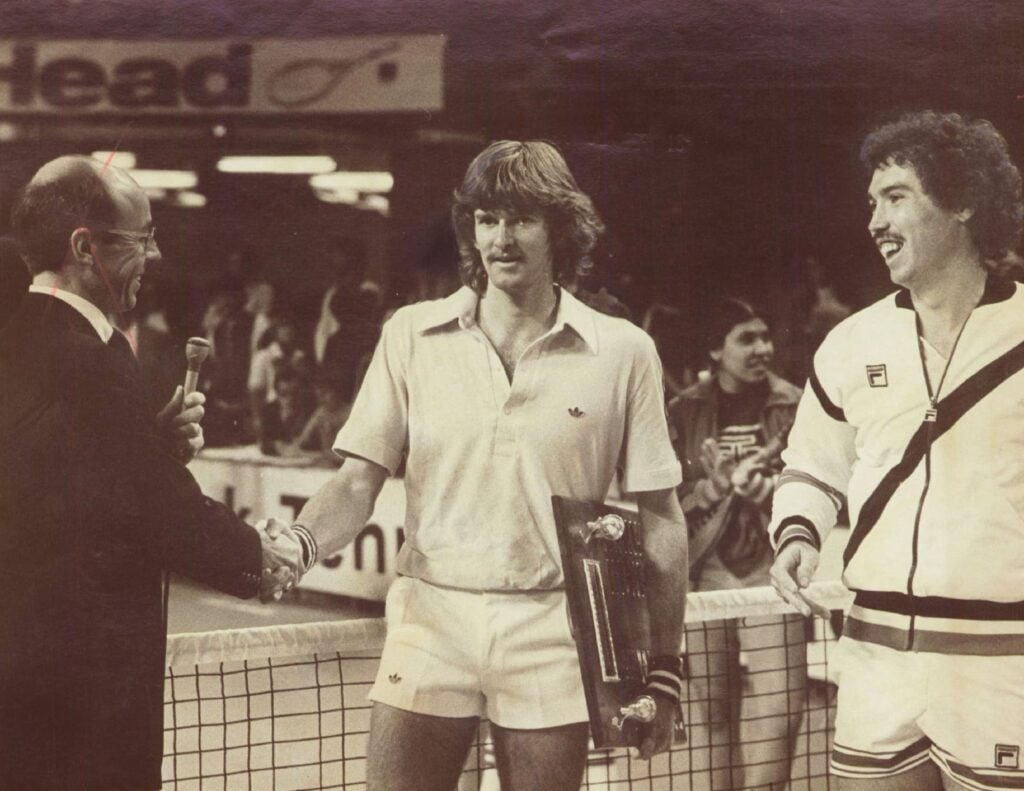 Kevin Curren, on the left, and Steve Denton, on the right, smiling after they won first title together in Denver.
