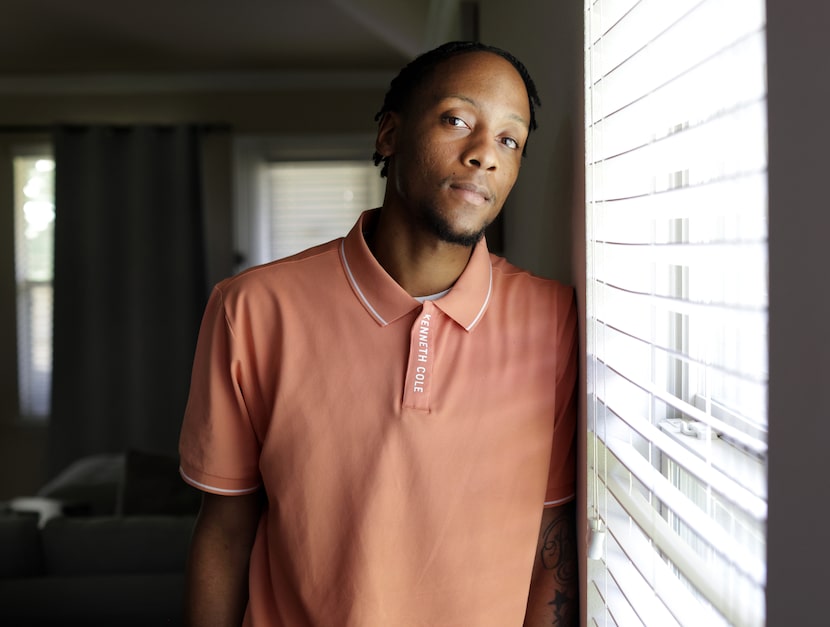 Darius Richardson poses for a photograph at his girlfriend's mother's home in Fort Worth,...
