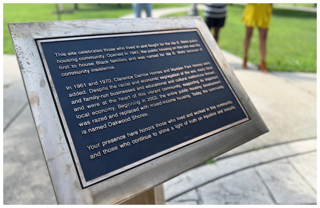 This plaque honoring the residents of the former Ida B. Wells Homes is one of three that were unveiled in a special ceremony at the "Light of Truth" Ida B. Wells Monument July 18.