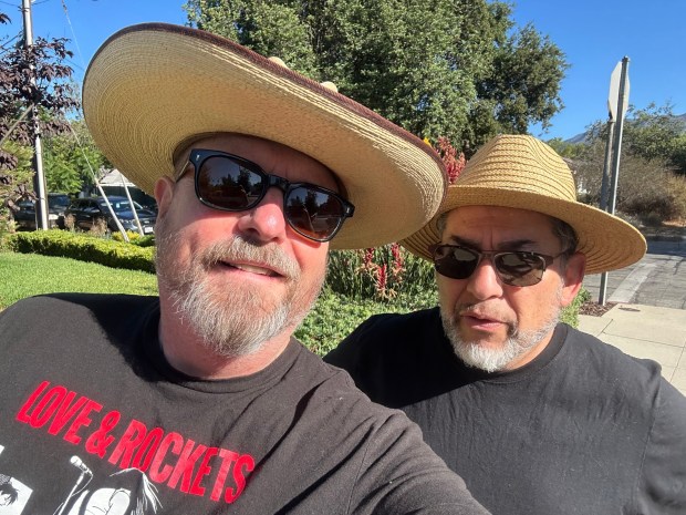 Erik Pedersen, wearing a Love & Rockets T-shirt, ran into Jaime Hernandez, the "Love & Rockets" creator and artist, while taking a morning walk in Pasadena. (Photo by Erik Pedersen)