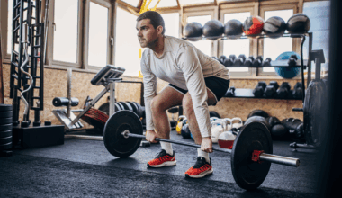 A man performing a deadlift at the gym