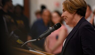 Gov. Maura Healey addresses a crowd at the State House in July 2025.