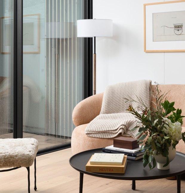 A rendering shows the interior living space of a model...