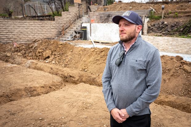 Alex Filler, 41, at the site of his former home...