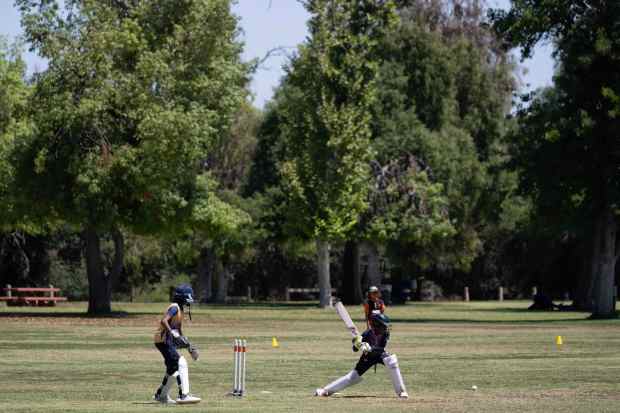 People practice cricket at the Sepulveda Basin Cricket Fields in...