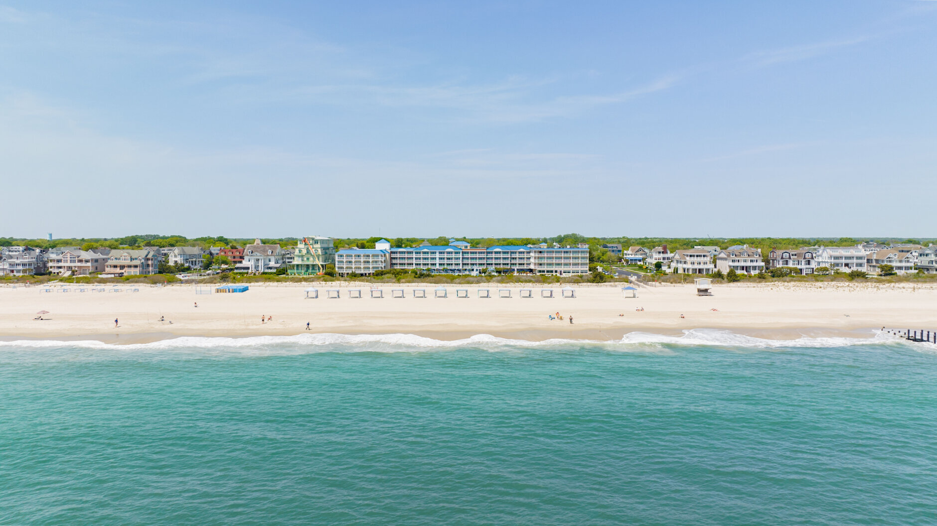 La Mer Beachfront Resort coastal view.