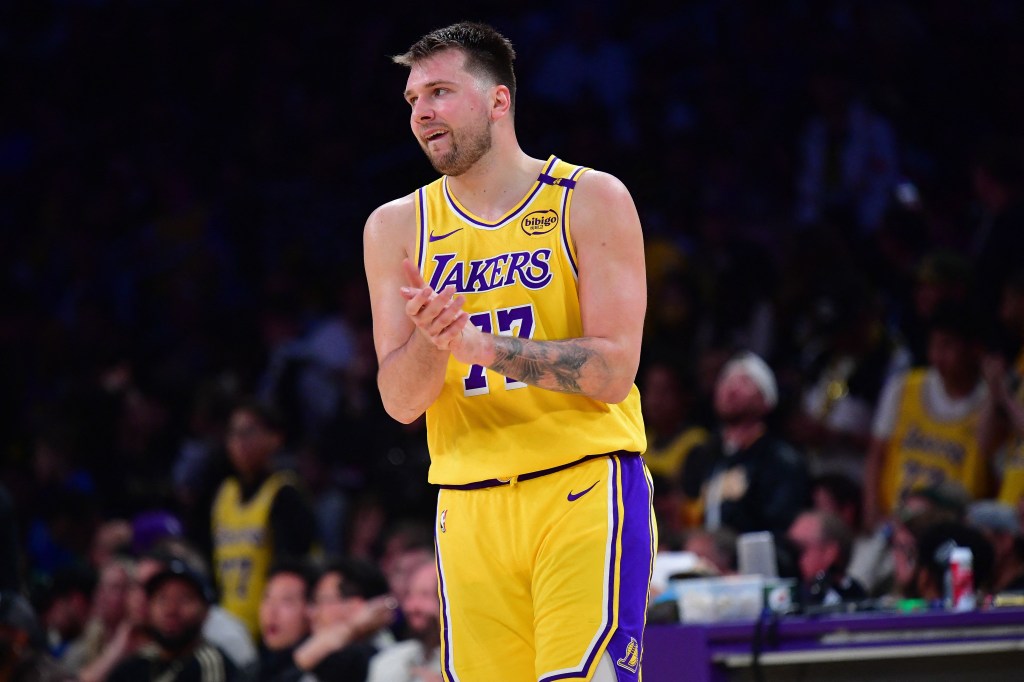 Los Angeles Lakers player clapping during a game.