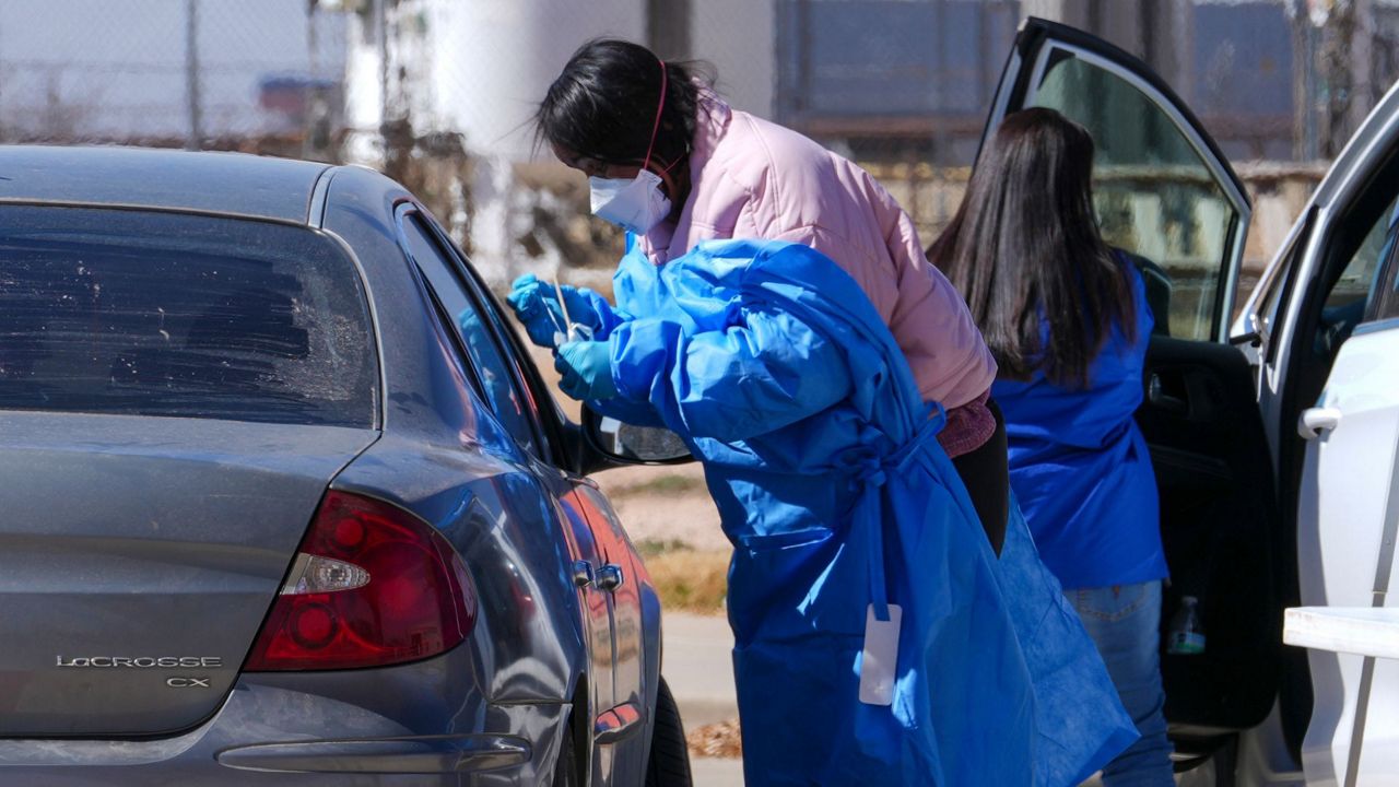 A health worker administers a measles test on Fernando Tarin, of Seagraves, Texas, at a mobile testing site outside Seminole Hospital District, Friday, Feb. 21, 2025, in Seminole, Texas. (AP Photo/Julio Cortez, File)