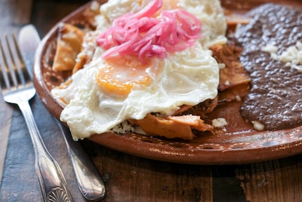 Chilaquiles Pibil are a brunch item at Taco y Vino in Dallas.