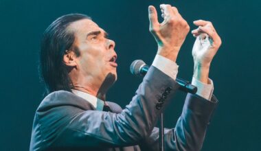 Nick Cave, No Longer So Angry About AI, Shares New “Tupelo” Video Starring an AI Elvis: Watch