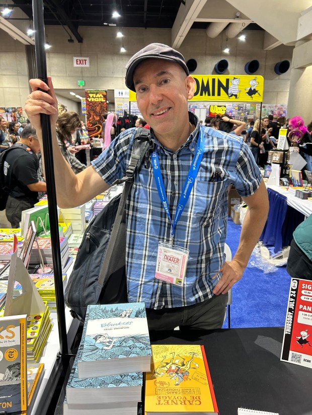 Graphic memoirist Craig Thompson poses for a photo after a...