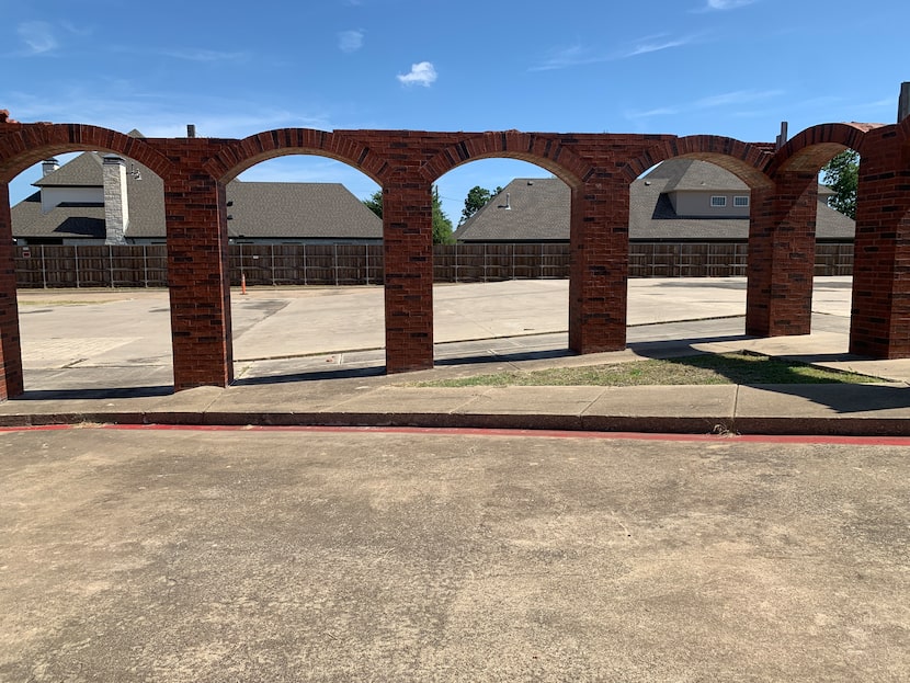 The residents of Wimberley Court behind the remnants of Primera Iglesia Bautista Mexicana de...