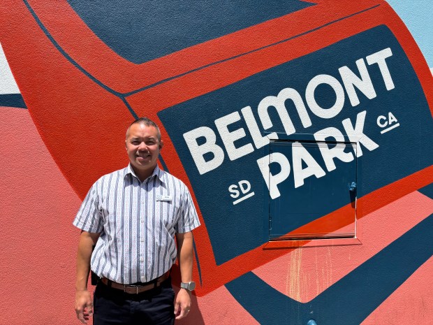 Longtime fan and Belmont Park employee Minh Tra has seen the 100-year-old amusement park in Mission Beach transform since reopening in 1990. (Elaine Alfaro)
