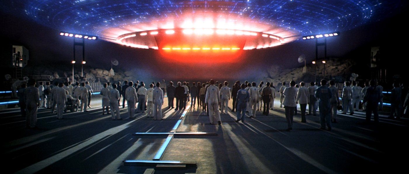 People Standing In Front Of Spaceship In Close Encounters Of The Third Kind