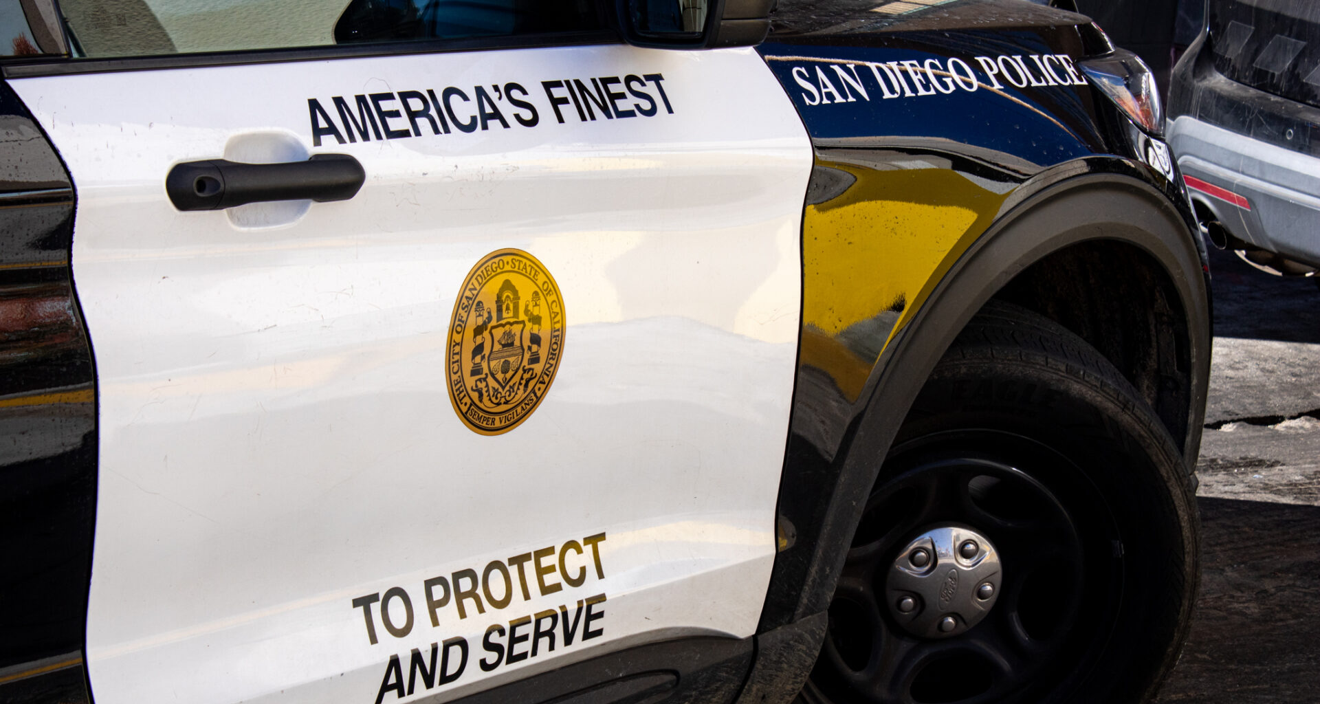 San Diego Police parked in the middle of the road to talk to a man yelling in Hillcrest on Dec. 20, 2022.