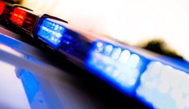 Police vehicle flashing lights. (Jason Deckman/Getty Images)