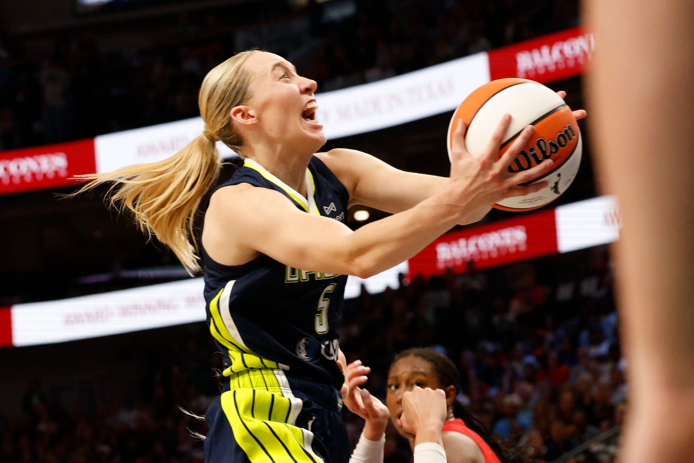 Dallas Wings guard Paige Bueckers (5) shoots the ball during the first half of an WNBA...