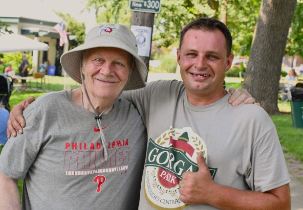 Local colorful characters Butch Adamo and James Dougherty share a...