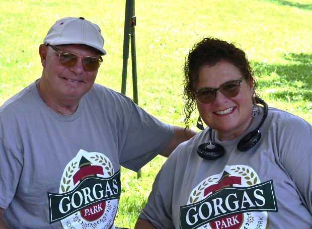 Fury and Cheryl Colubriale manned an information table for the...