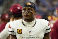 FILE - Washington Commanders wide receiver Terry McLaurin (17) looks on from the sideline...