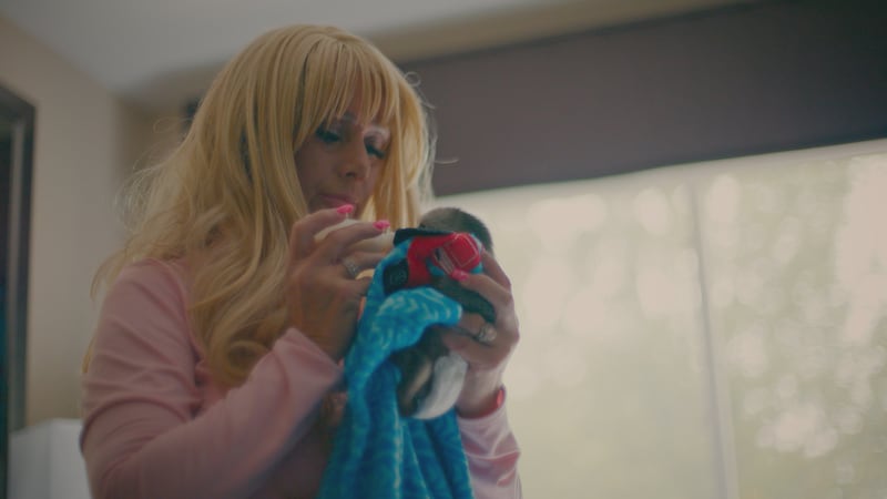 Tonia Haddix feeds a baby chimp in ‘Chimp Crazy.’