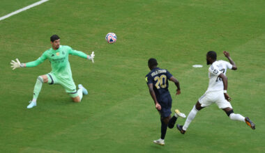 MIAMI GARDENS, FLORIDA - JULY 01: Randal Kolo Muani #20 of Juventus FC takes a shot against Thibaut Courtois #1 and Antonio Ruediger #22 of Real Madrid C.F. during the FIFA Club World Cup 2025 round of 16 match between Real Madrid CF and Juventus FC at Hard Rock Stadium on July 01, 2025 in Miami Gardens, Florida. (Photo by Kevin C. Cox/Getty Images)