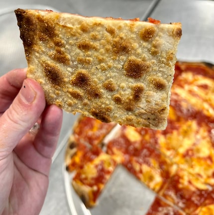 One Trick Pony will sell Chicago tavern-style pizzas, which have a thin, blistered crust. 