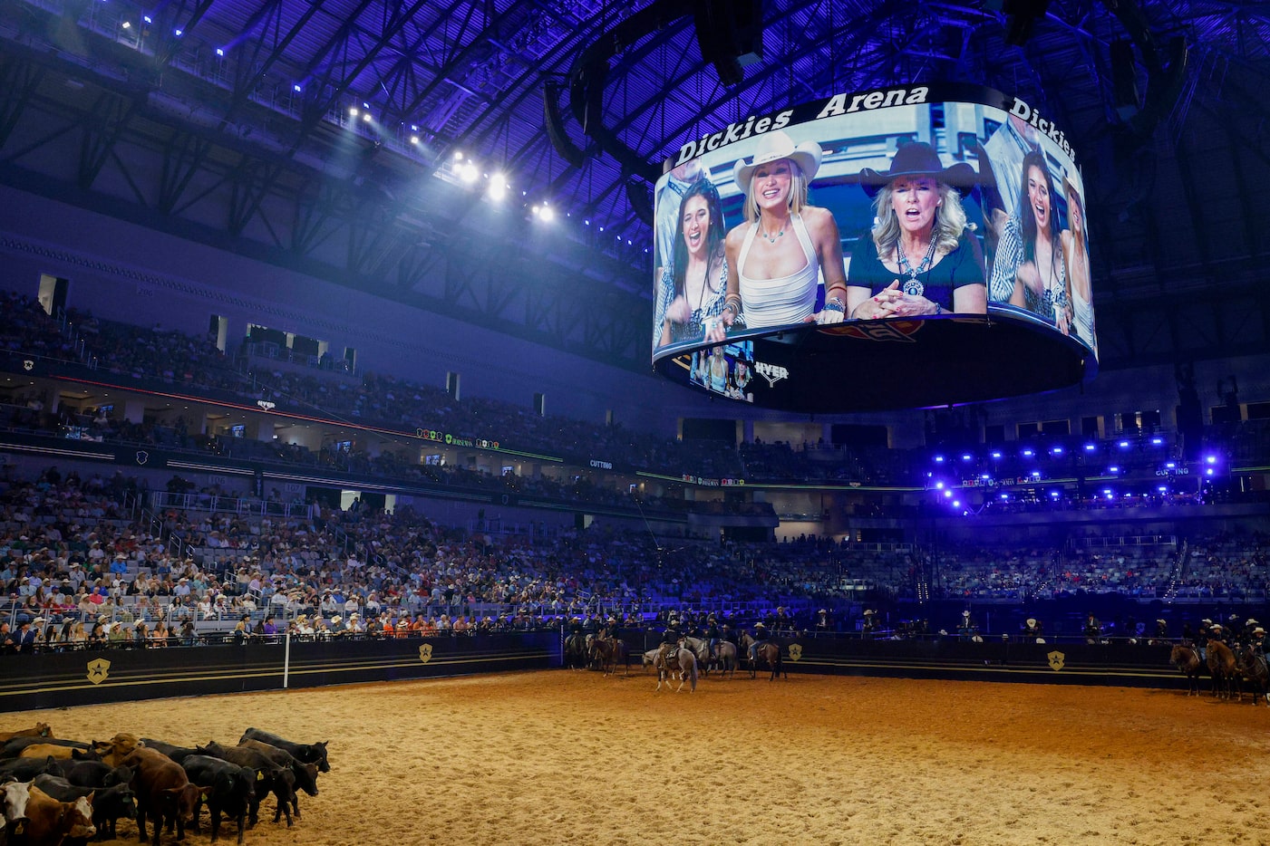 Bella Hadid is seen on the video board during The American Performance Horseman competition...