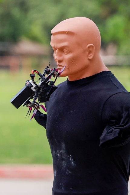 A Campus Guardian Angel drone crashes into a dummy during a demonstration at Lancaster...