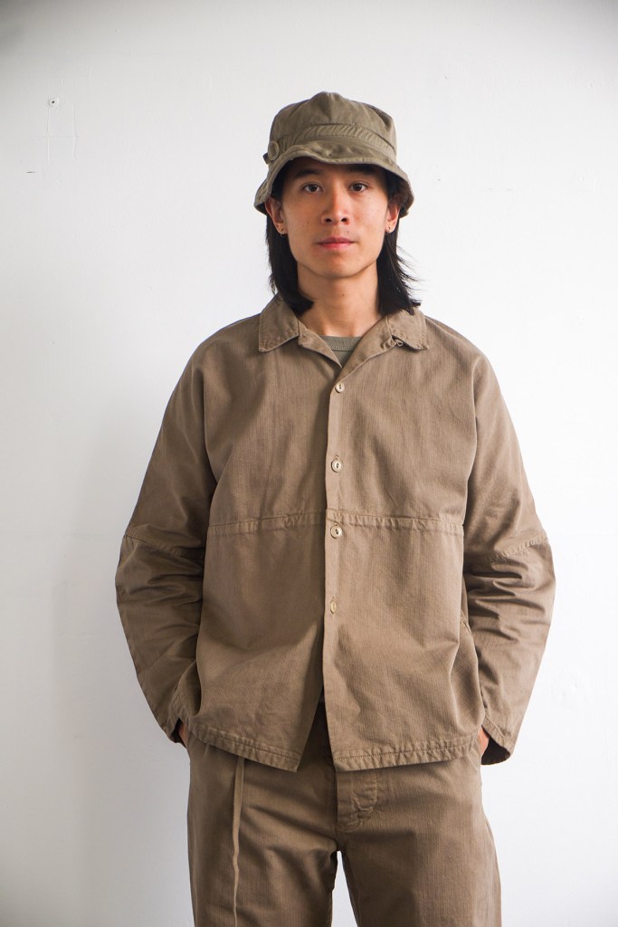 Elliot Young models an All we remember ensemble in light brown made for the brand