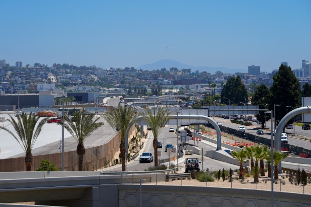 The new airport road coming off Harbor Drive is scheduled to open on Friday. Lane 1 (on the right) directs you to Terminal 2, while lanes 2 and 3 lead to Terminal 1 at San Diego International Airport. (Nelvin C. Cepeda / The San Diego Union-Tribune)