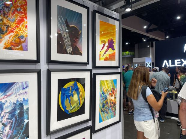 Alex Ross Art was selling original paintings for $35,000 per painting. (Michelle Guerrero / The San Diego Union-Tribune)