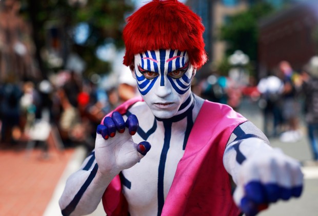 Otman Shouli of Portland dressed as Akaza from the "Demon Slayer" series at Comic-Con in 2024. The anime franchise will take over Hall H for the first time this year. (K.C. Alfred / The San Diego Union-Tribune)