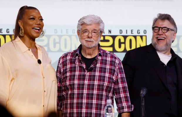 Queen Latifah, George Lucas, and Guillermo del Toro take photos at the Sneak Peek: Lucas Museum Of Narrative Art panel during Comic-Con International on July 27, 2025 in San Diego, California. (K.C. Alfred / The San Diego Union-Tribune)