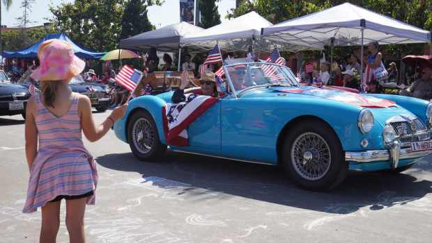 ....People drive a classic coupe to participate the parade at Orange Ave on Friday, July 4, 2025 in Coronado, CA. (Michael Ho / The San Diego Union-Tribune)
