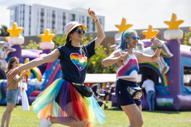 Michelle Jacobson, left, and Liz Dennett dance at The J Pride Festival, Saturday, July 19, 2025 in San Diego, CA. (Zoë Meyers / For The San Diego Union-Tribune)