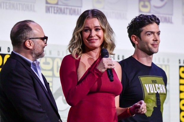 Rebecca Romijn, from left, Ethan Peck, and Jess Bush attend a panel for "Star Trek: Strange New Worlds" during Comic-Con International on Saturday, July 26, 2025, in San Diego. (Photo by Richard Shotwell/Invision/AP)