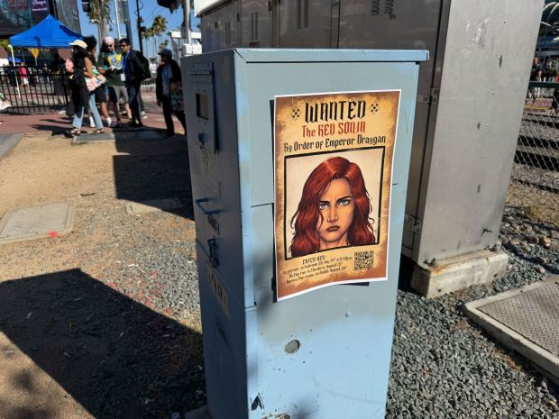 Wanted signs for the new "Red Sonja" movie spotted outside Comic-Con during Preview Night. (Phillip Molnar / The San Diego Union-Tribune)