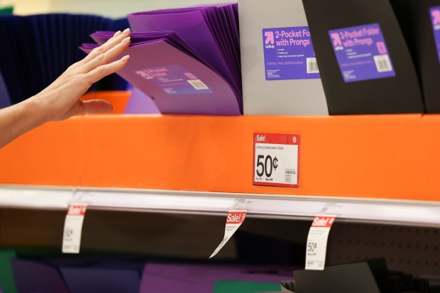 Stacey Gubernator grabs a folder at Target on Tuesday, July 22, 2025 in San Diego, CA. (Meg McLaughlin / The San Diego Union-Tribune)