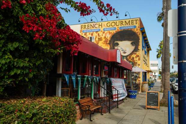 This area on Turquoise Street in north Pacific Beach, including The French Gourmet restaurant, is planned for a 22-story mixed-use building. (Alejandro Tamayo / The San Diego Union-Tribune)