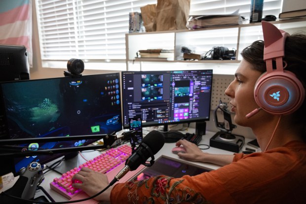 Kolterman plays an underwater exploration game called Subnautica on Twitch on Thursday, July 3, 2025, in Coronado. She has wanted to join the military since she was a child and is unsure of what to do next. (Ana Ramirez / The San Diego Union-Tribune)