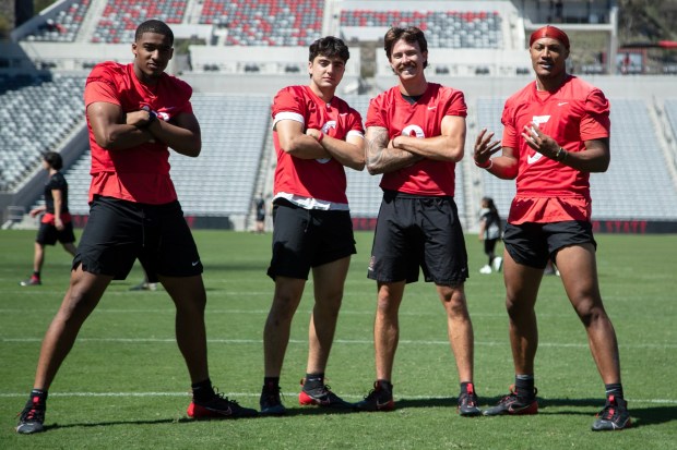 SDSU's quaterbacks, Jayden Denegal (10), JP Mialovski (6), Kyle Crum (9), and Bert Emanuel Jr (5), pose during the AztecFAST Showcase held on Saturday at Snapdragon Stadium in San Diego, CA. (Xavier Hernandez for the UT