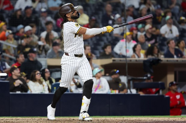 San Diego Padres' Fernando Tatis Jr. hits a home run against the Washington Nationals during the ninth inning at Petco Park on Monday, June 23, 2025 in San Diego, CA. (Meg McLaughlin / The San Diego Union-Tribune)