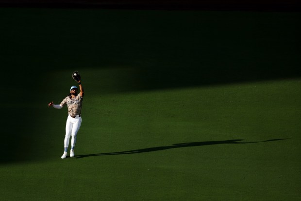 Fernando Tatis Jr. #23 of the San Diego Padres catches Kyle Higashioka #11 of the Texas Rangers fly ball during the ninth inning at Petco Park on Friday, July 4, 2025 in San Diego, CA. (Meg McLaughlin / The San Diego Union-Tribune)